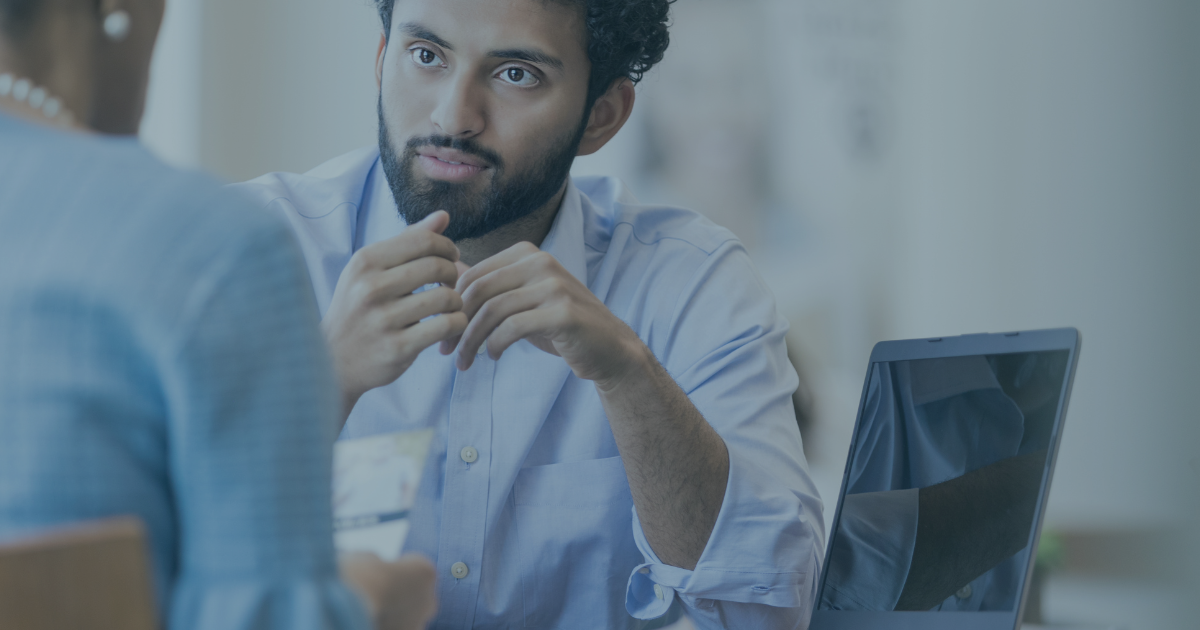 A man and women talking during an interview