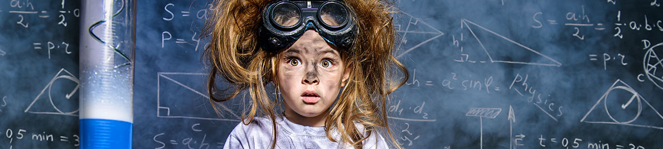 Young girl working on a rocket science project