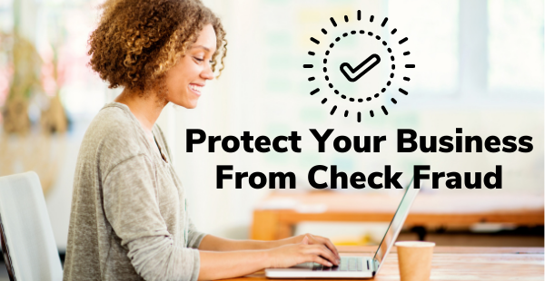 Business woman on laptop with heading - four things to do to protect your business from check fraud