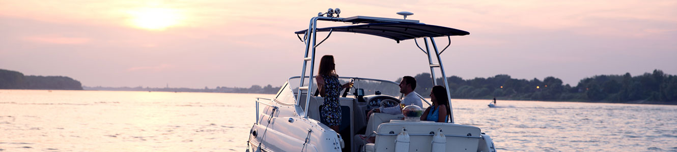 People on a recreational boat on a lake